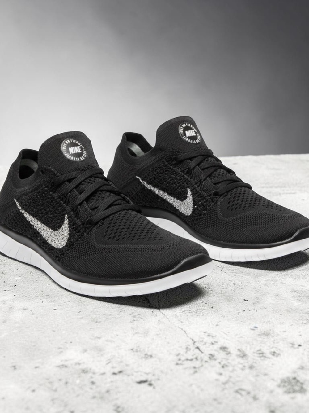 Nike Women’s Black and White Lightweight Flyknit Running Shoes